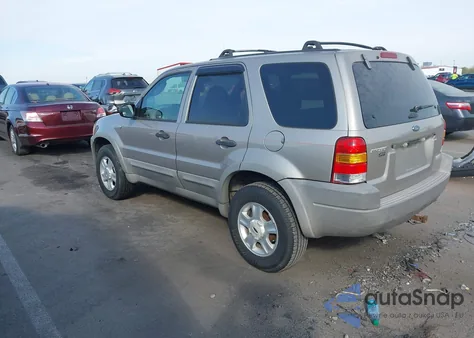 2001 Ford Escape Xlt z USA, uszkodzony, nr VIN 1FMCU04131KB60072